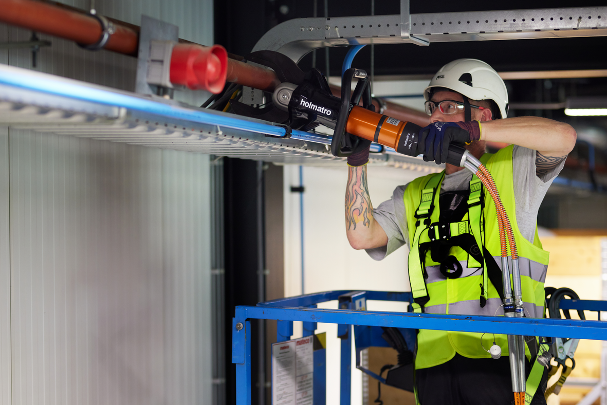 HMC Cutter in action in scissor lift_1181x788px_2_NR-29877
